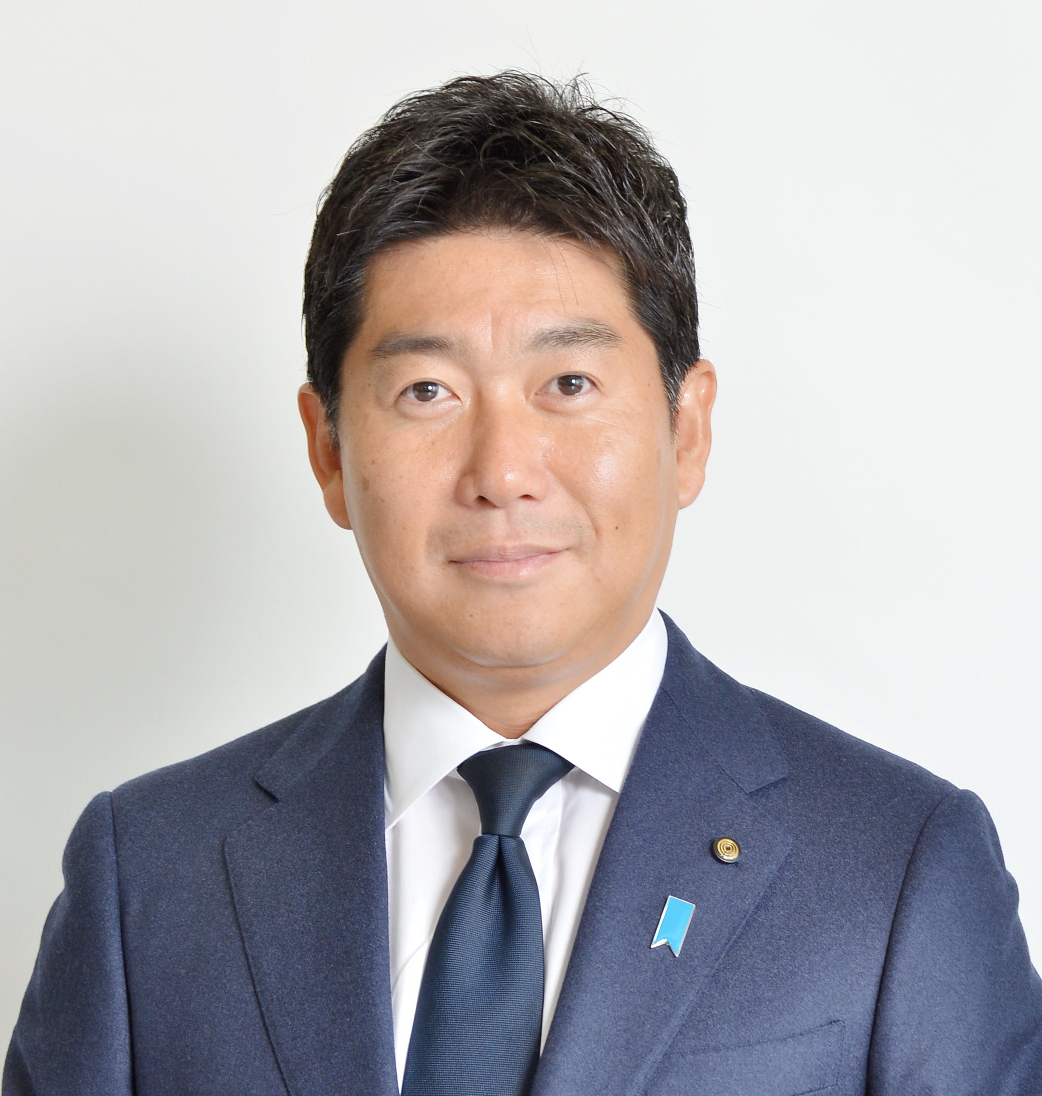 川崎市長　顔写真